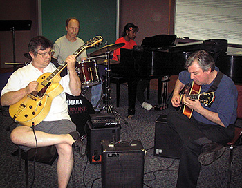Brian Kelly playing guitar